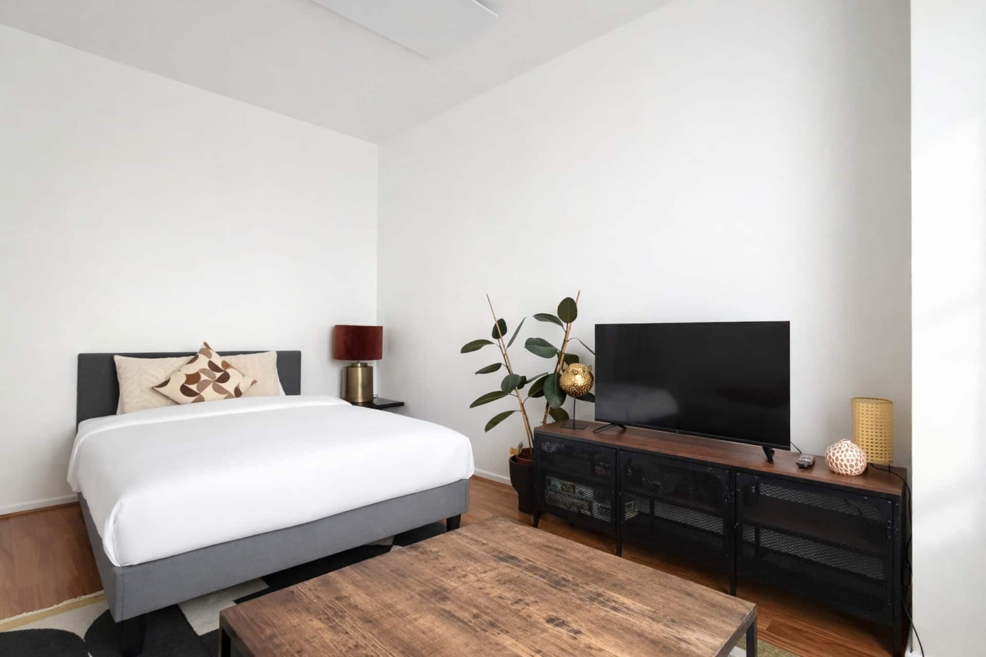 Double bed with TV and coffee table